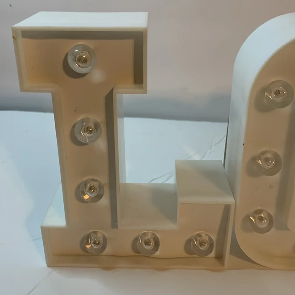 LOVE Letters Light up Size is Approximately 6 1/4 x 5 Plastic Used
